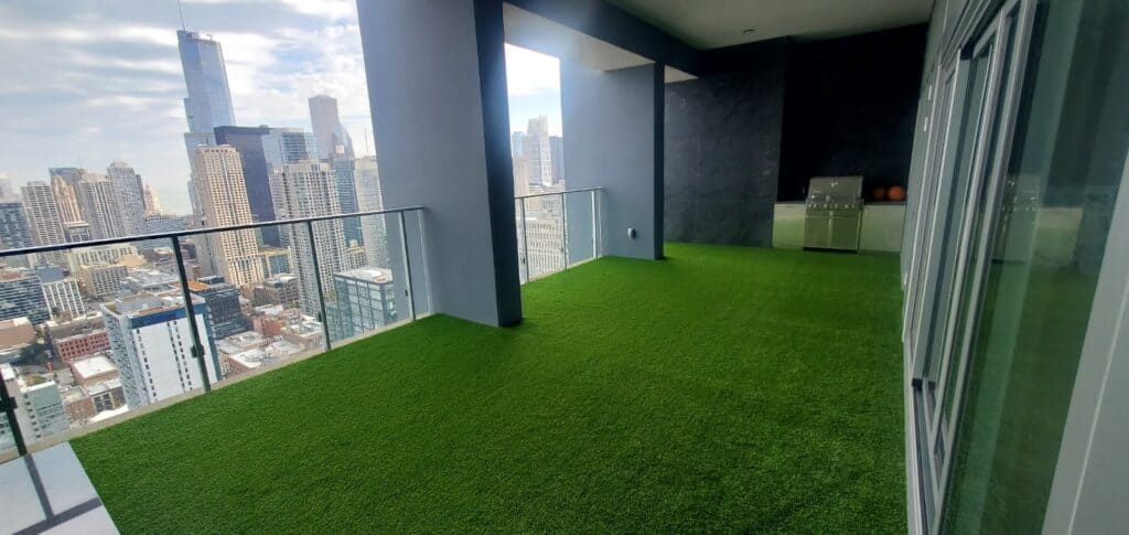 Artificial turf on a high-rise terrace overlooking the Chicago skyline