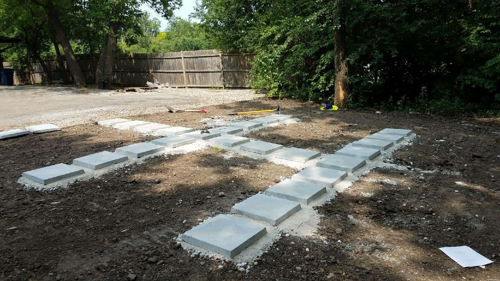 Bluestone stepping stone path being set into a prepared base